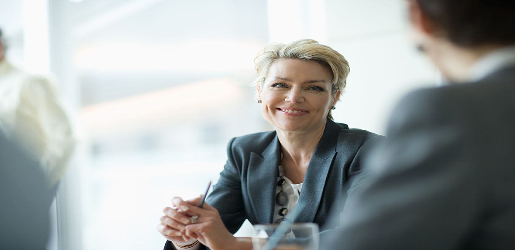 Old professional women smiling