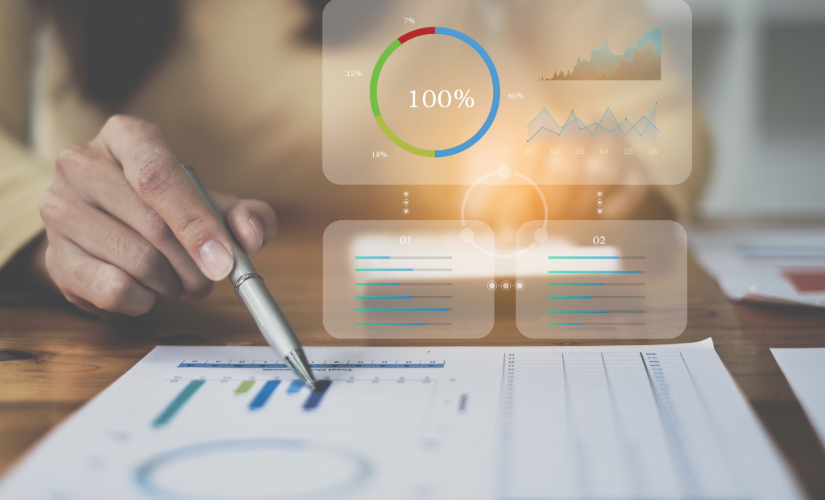 Hand pointing at document with graphs and percentages displayed.