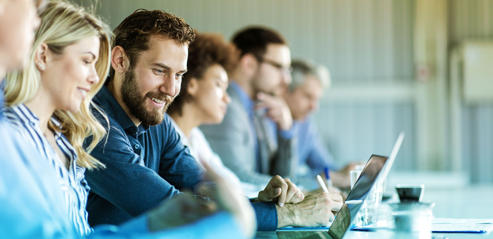 Group of professionals working at a table