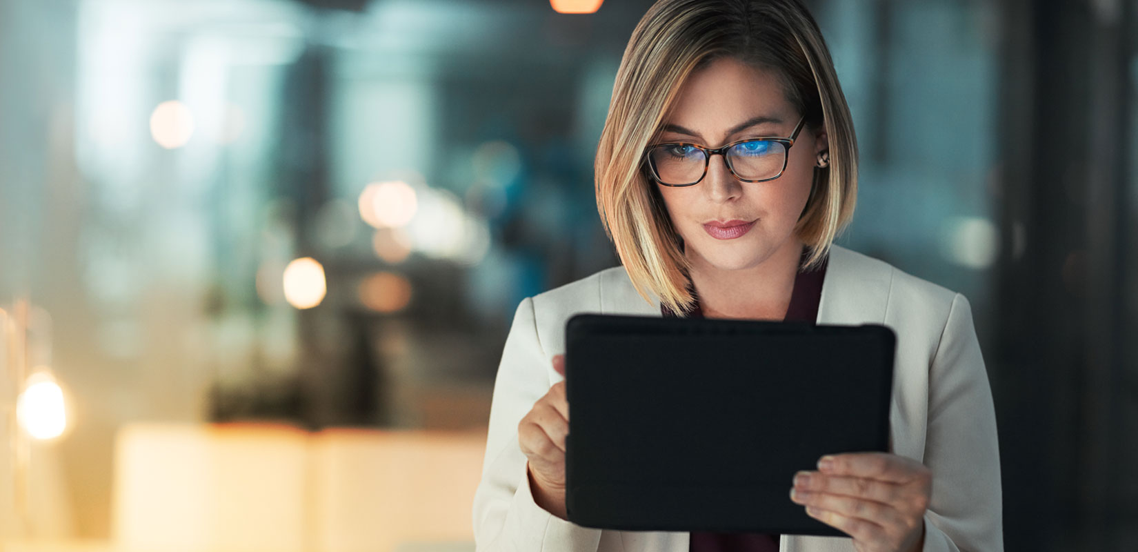 Professional lady looking at a tablet