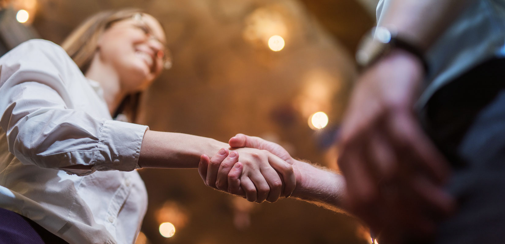 Two people shaking hands